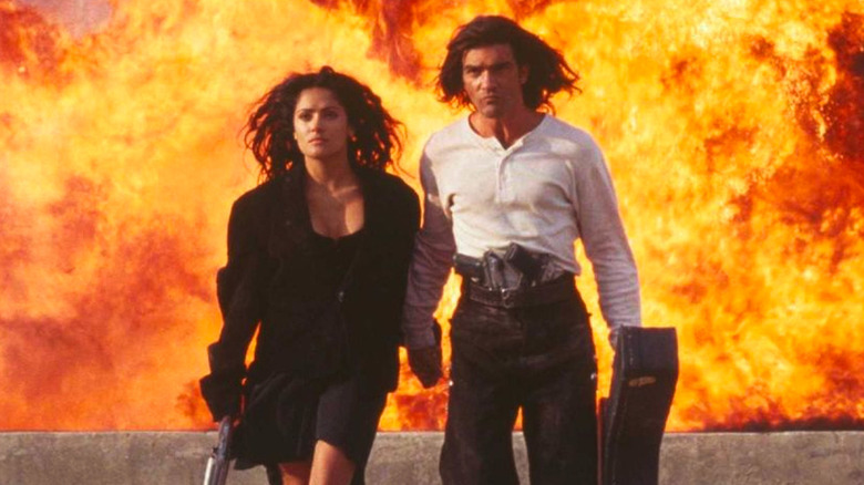 El Mariachi and Carolina escaping an explosion