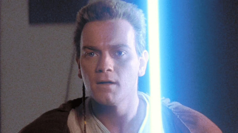 Obi Wan Kenobi wielding a lightsaber