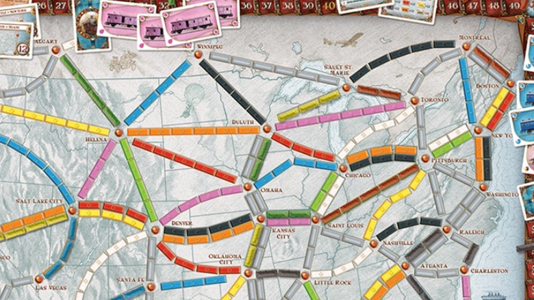 Ticket to Ride game board: nineteenth-century map of the U.S. with colorful train tracks