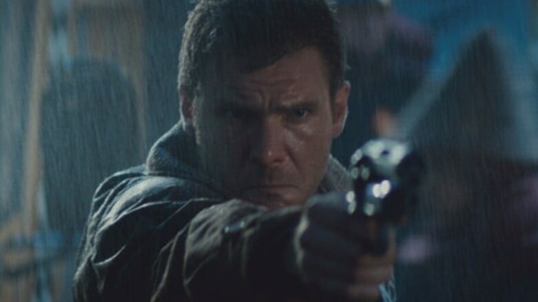 Deckard aims his gun