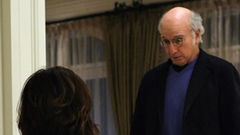 Larry David looks down