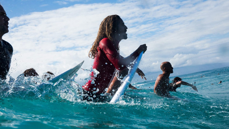 Men surfing in Momentum Generation