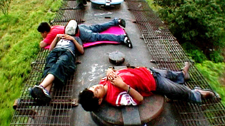 Kids lying on train