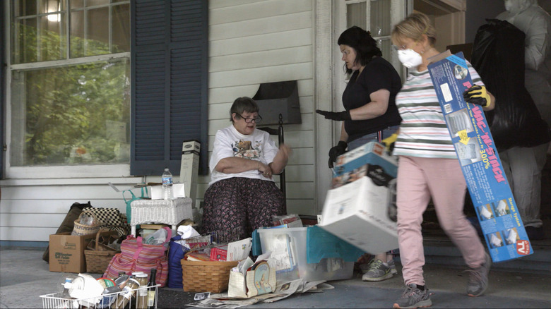 Carol creates a mini-hoard around her during cleanup