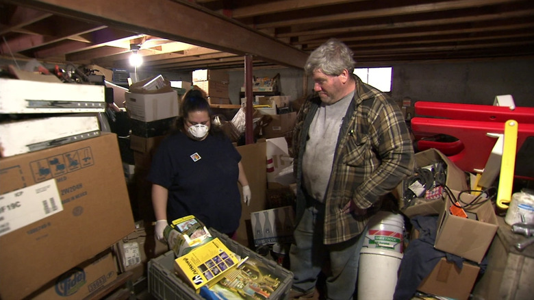 Warren in his hoarded home