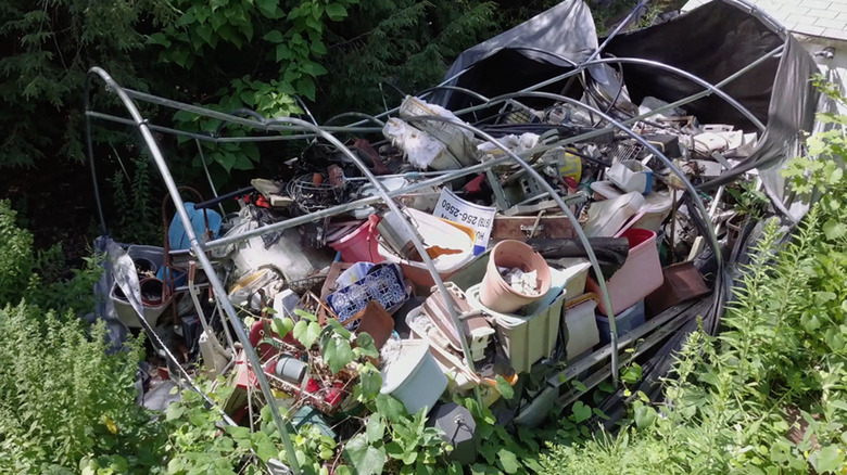 Junk piled up in the yard