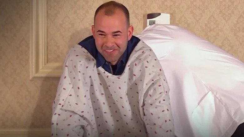 Murr wearing a hospital gown