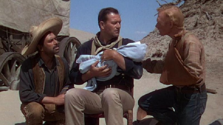 John Wayne holds baby