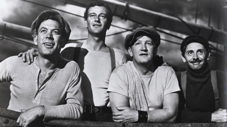 John Wayne with fellow sailors