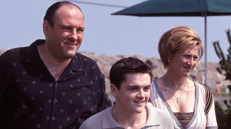 Tony, Carmela, and A.J. stand on beach