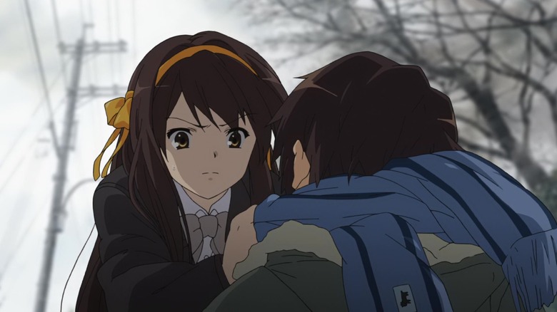 Haruhi clutching Kyon's collar