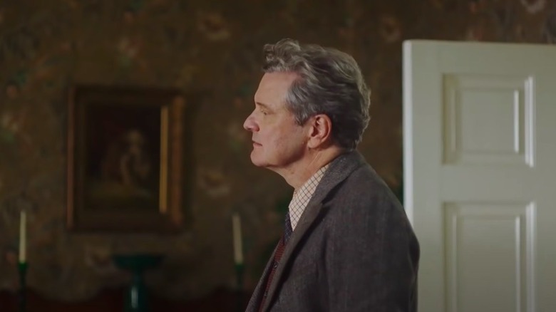 Firth stands as Mr. Niven