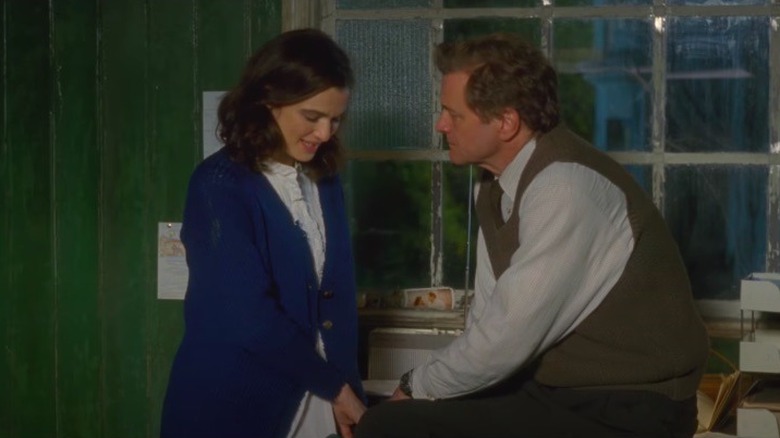 Firth stands with Weisz