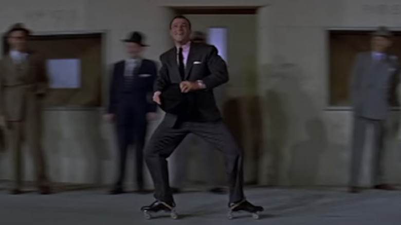 Gene Kelly dancing on roller skates