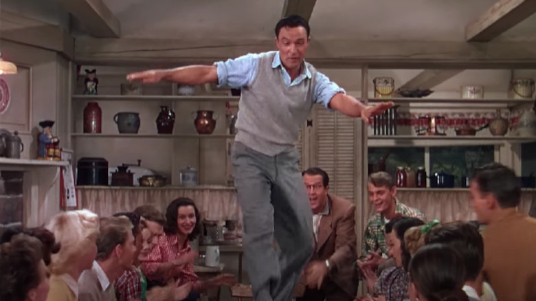 Gene Kelly dancing on a table