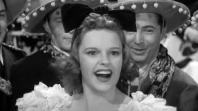 Judy Garland smiles during number