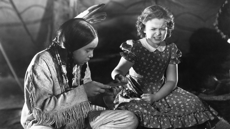 Shirley Temple gets her finger cut