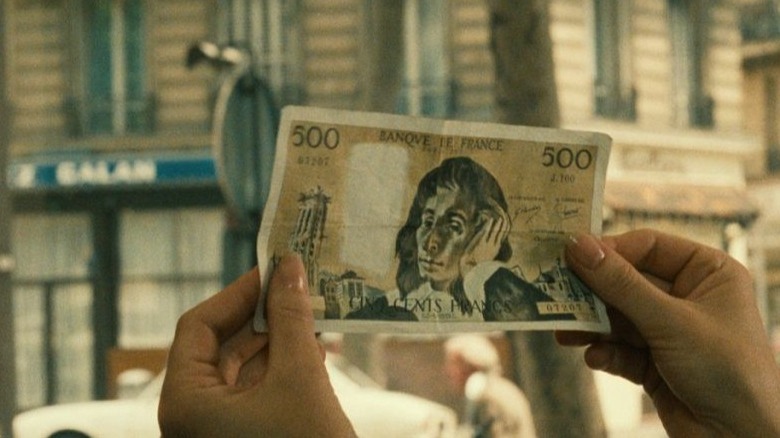 500 franc note in sunlight