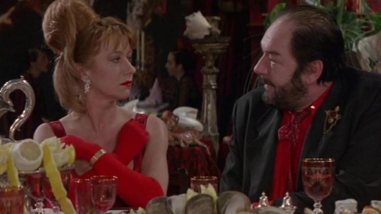 Michael Gambon and Helen Mirren seated and staring at each other