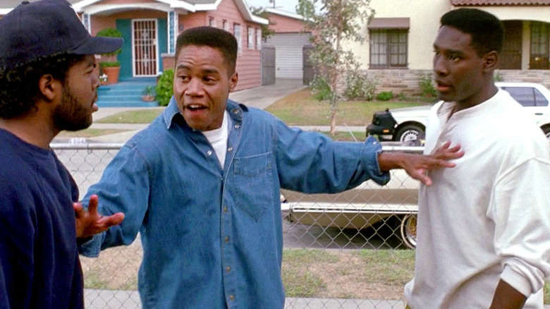 Cuba Gooding Jr puts his arms between Ice Cube and Morris Chestnut