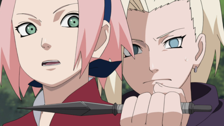 Ino attacks Sakura with knife