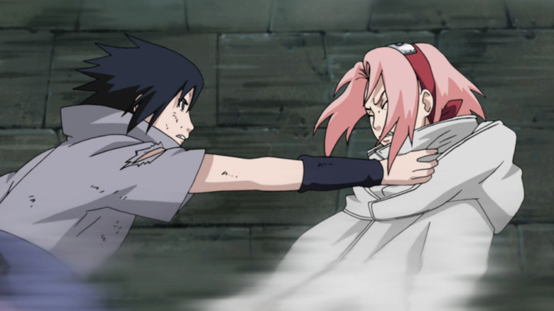 Sasuke grabs Sakura's throat