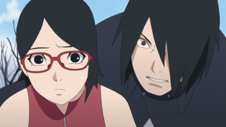 Sasuke protects Sarada from attack