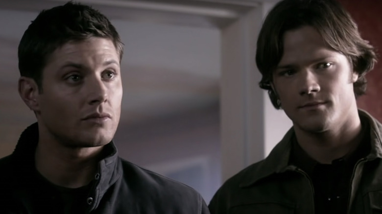 Dean and Sam standing