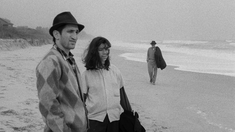 Eszter Balint, John Lurie, and Richard Edson on a beach