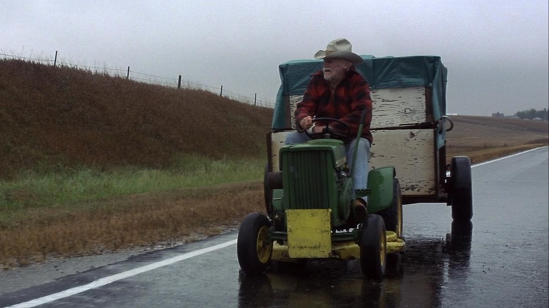 Richard Farnsworth driving a lawn mower