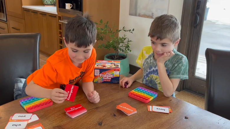 Two kids playing The Fidget Game