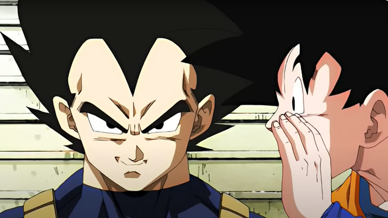 Goku whispers to Vegeta