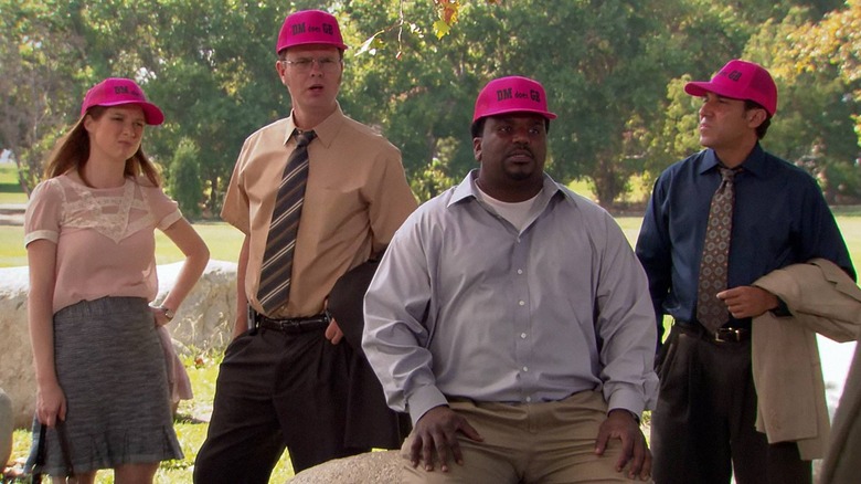 Erin, Dwight, Darryl, and Oscar pink hats