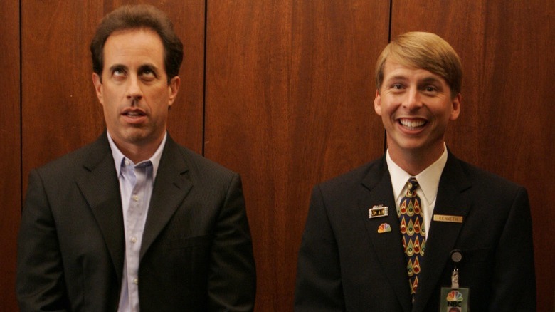 Jerry Seinfeld rolls eyes while Kenneth Parcell smiles