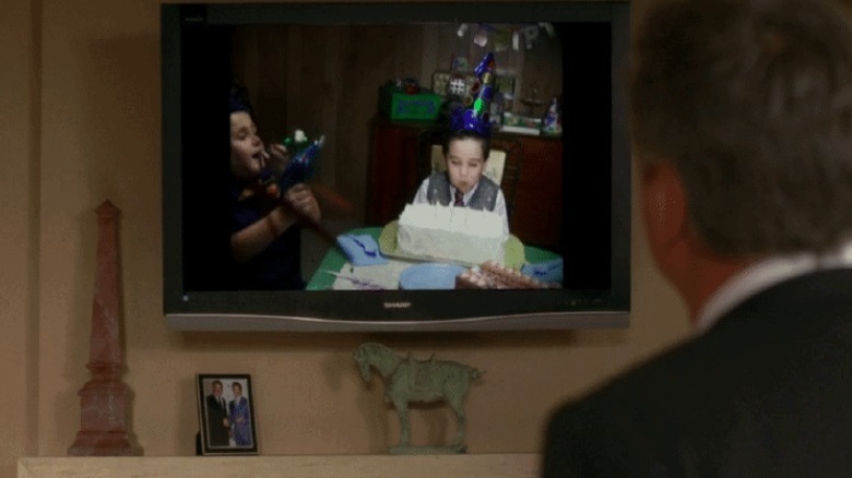 Jack Donaghy watches a childhood video