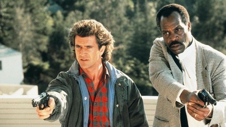 Martin Riggs and Roger Murtaugh with guns