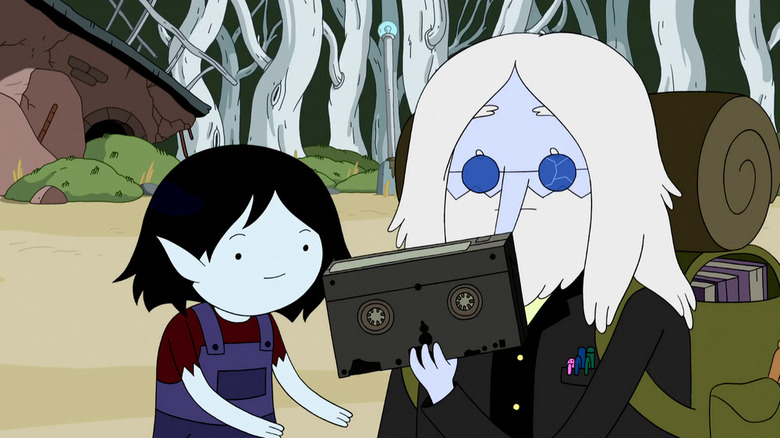 Marceline and Simon looking at videotape