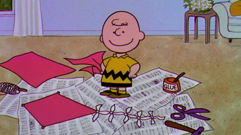 Charlie Brown prepares a kite