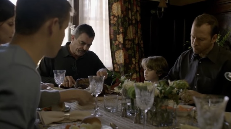 Family talking over dinner 