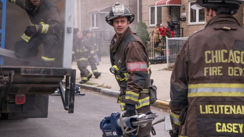 A team of firefighters stand in a hospital Chicago Fire