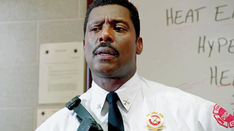 A firefighter looks left Chicago Fire