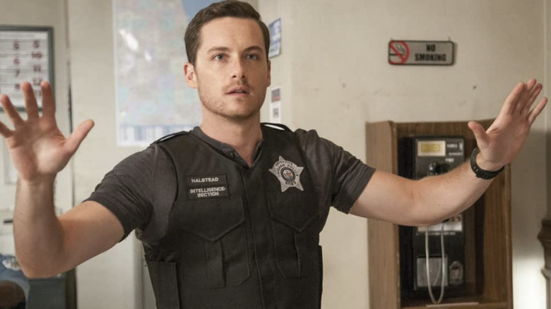 Chicago P.D. Jesse Lee Soffer with his hands up