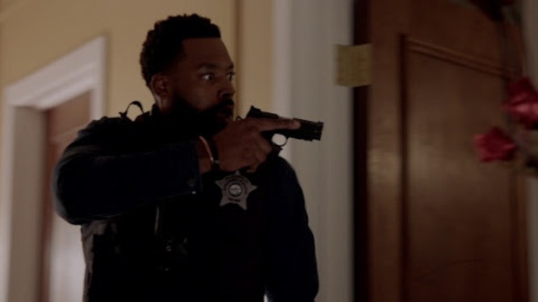 Chicago P.D. Atwater aims his gun