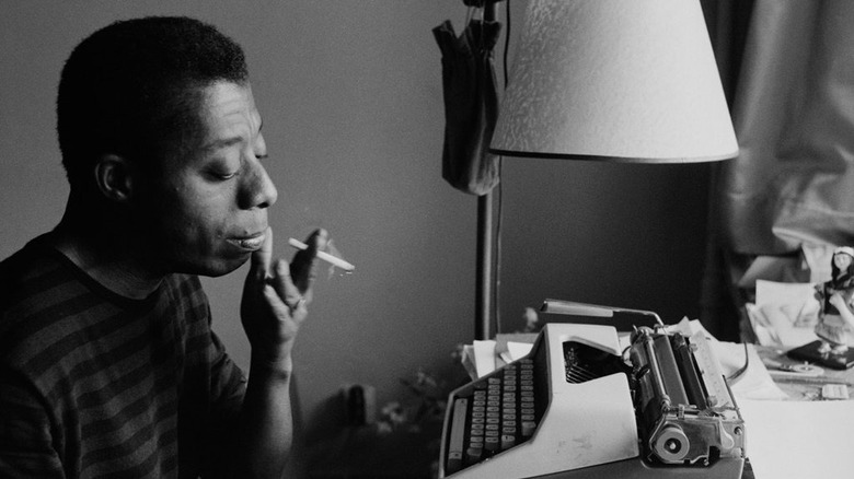 James Baldwin at typewriter