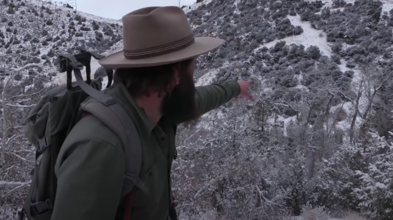 Jake points to a mountain lion