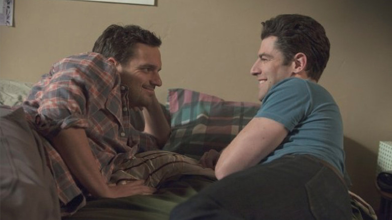 Nick and Schmidt lay in bed