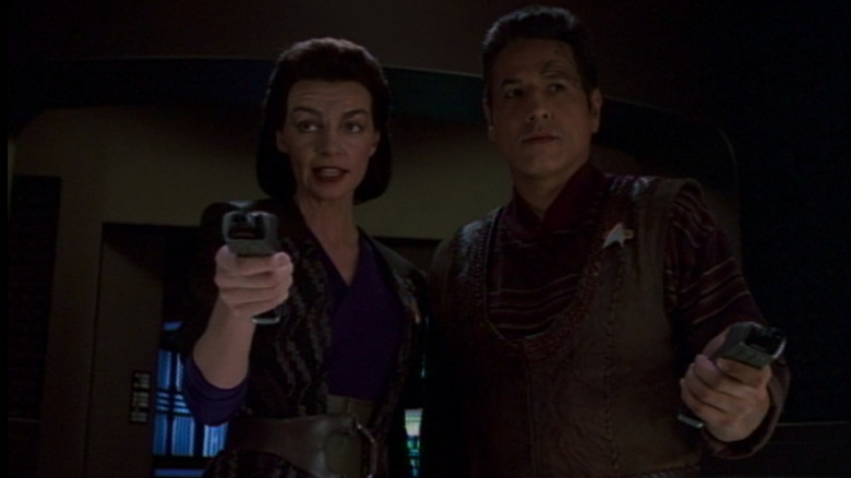 Chakotay and Seska aim their phasers