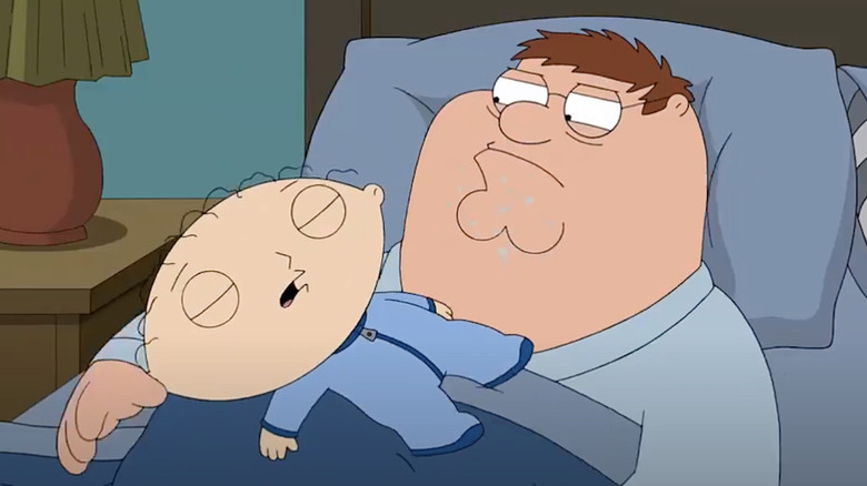 Stewie sleeping on Peter