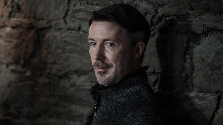 Littlefinger standing in Winterfell