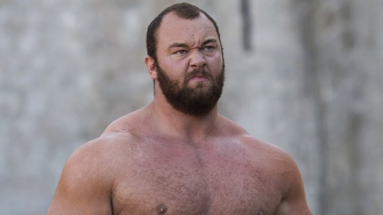 The Mountain standing shirtless